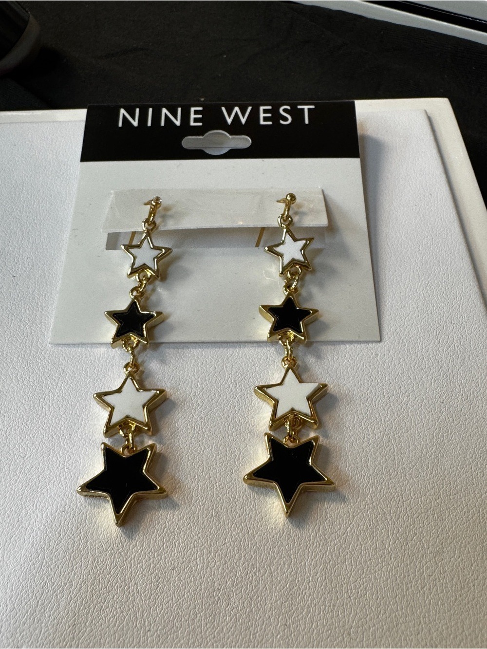 Nine West Gold Tone Drop Earrings with Black and White Stars